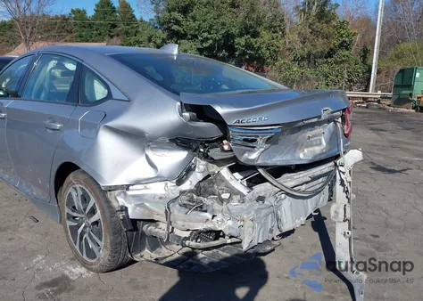 2021 Honda Accord Hybrid z USA, uszkodzony, nr VIN 1HGCV3F1XMA013159